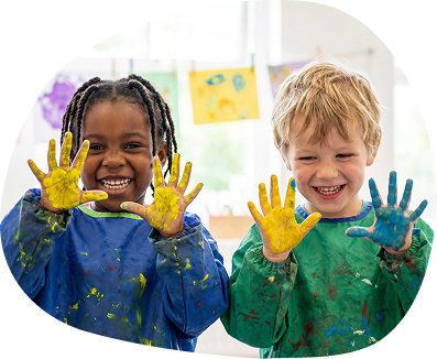 Happy diverse children showing colorful painted hands messy art class kindergarten students creative learning school education fun play childhood joy painting